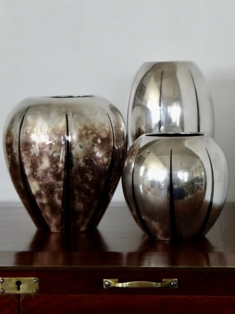 A Trio of Art Deco Silver plated WMF Ikora vases