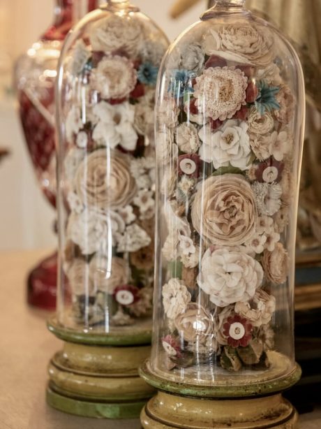 Pair of 19th century bouquets in silk fabric under hand blown domes c.1880