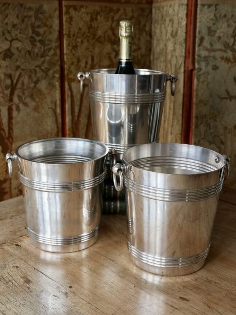 A trio of mid century silver plate Christofle Champagne buckets