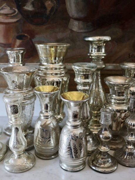 Antique mercury glass candlesticks and vases