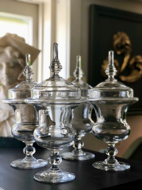 Antique French glass pharmacy jars with lids