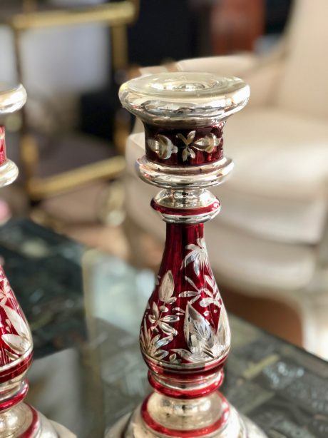 A pair of red and silver mercury glass candlesticks c.1860-1870