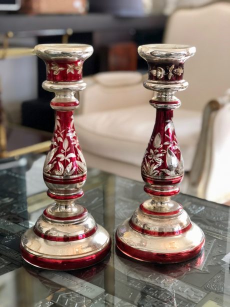 A pair of red and silver mercury glass candlesticks c.1860-1870