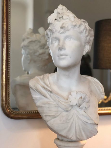 Marble Bust of a young girl, signed Madrassi.
