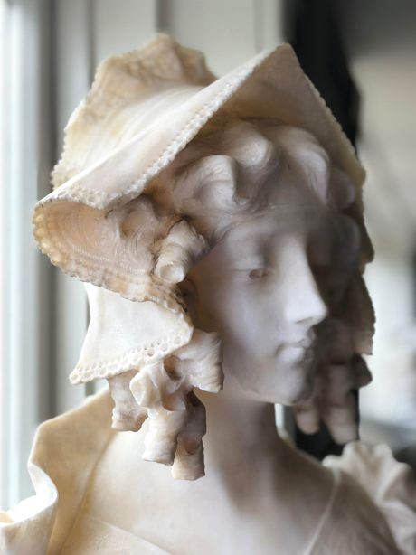 Alabaster Bust of young woman on marble