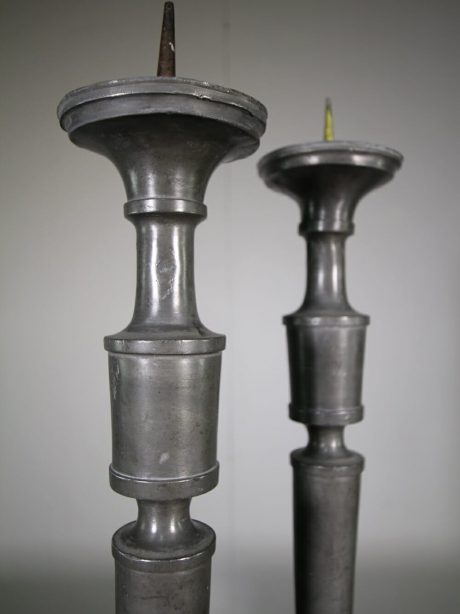 A pair of large 19th century pewter candlesticks