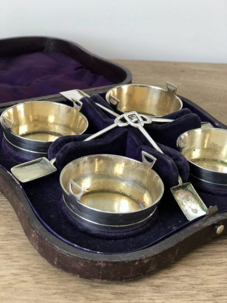 Boxed set of four silver plated barrels with shovel spoons