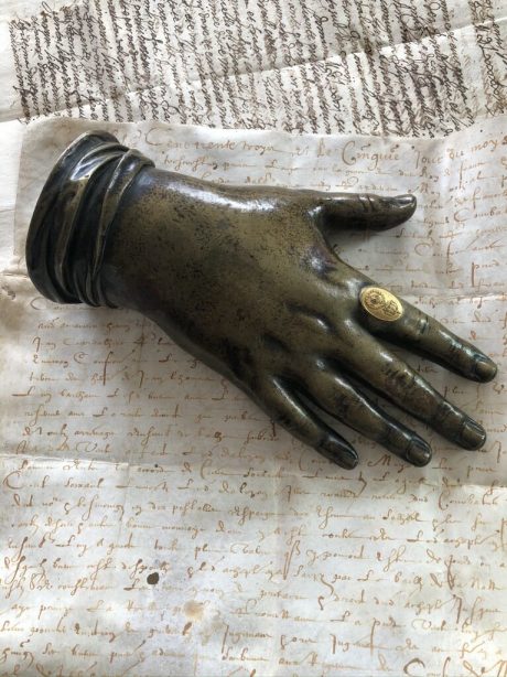 Bronze paper weight sculpture in the form of a hand