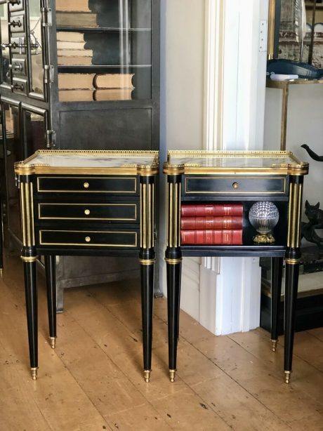 A Pair of French Louis XVI style ebonised mahogany bedside tables with brass accents