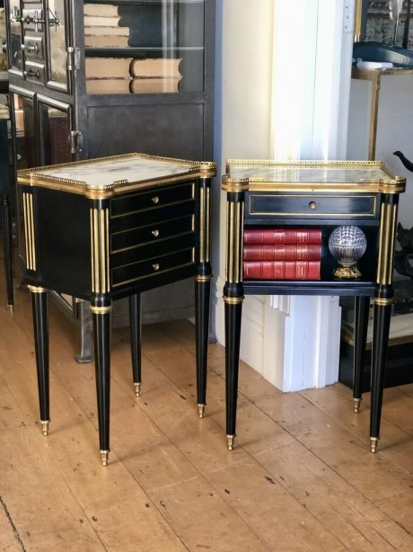 A Pair of French Louis XVI style ebonised mahogany bedside tables with brass accents