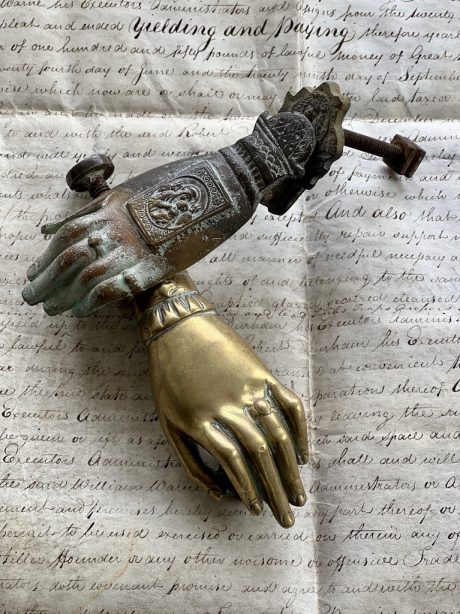 A pair of antique hand of Fatima door knockers