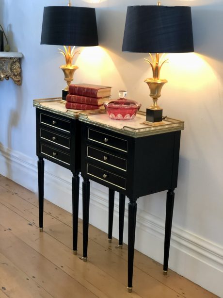 A Pair of French Louis XVI style bedside tables