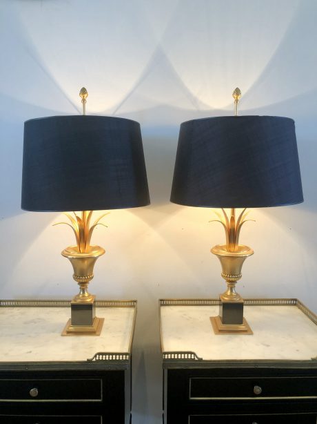 A pair of Hollywood Regency gilded brass palm lamps