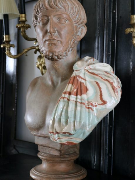 A striking Italian terracotta and ceramic Roman male bust