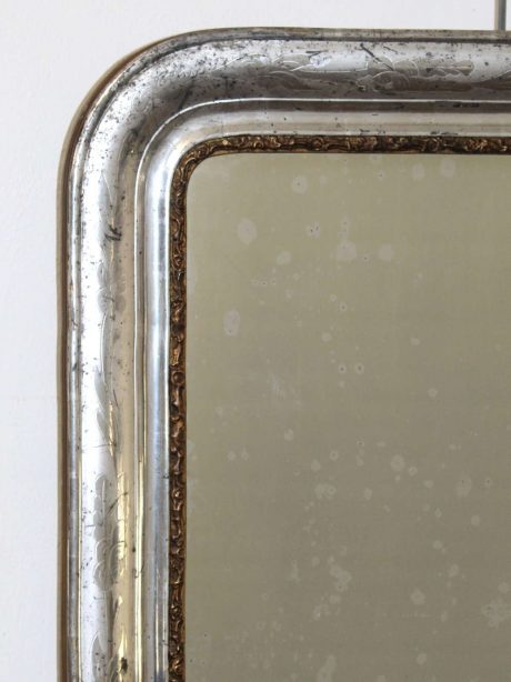 An antique 19th century silver gilt French mirror
