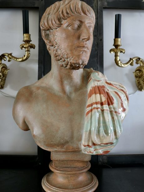 A striking Italian terracotta and ceramic Roman male bust
