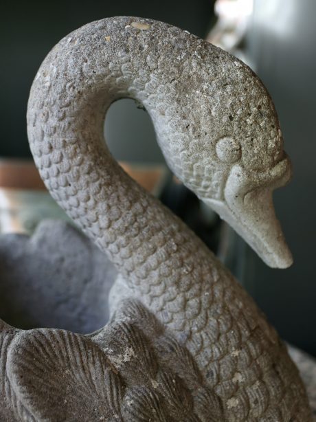 A vintage composite stone swan planter from the 1950's