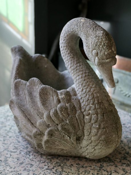 A vintage composite stone swan planter from the 1950's