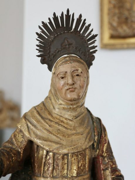 A Spanish antique hand carved wooden statue of St Theresa
