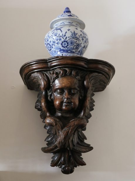 An antique walnut hand carved wall bracket c.1800