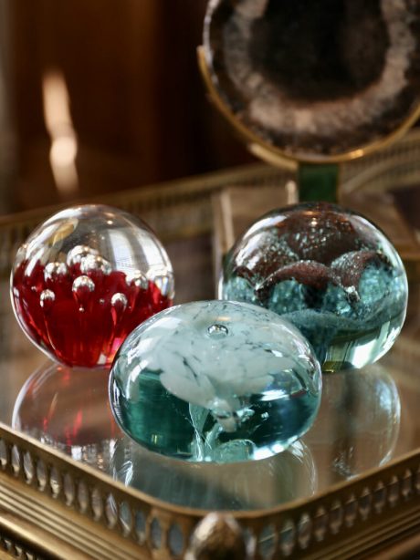 Trio of hand blown glass paperweights