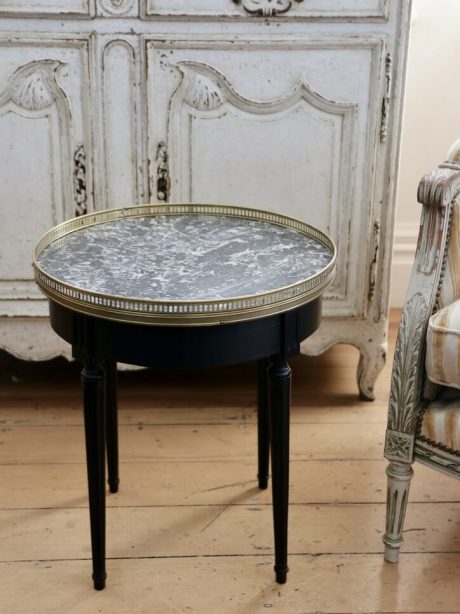 An ebonised Empire style marble topped side table c.1940