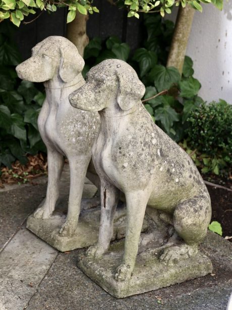 A pair of English reconstituted hunting hounds