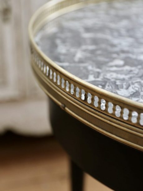 An ebonised Empire style marble topped side table c.1940