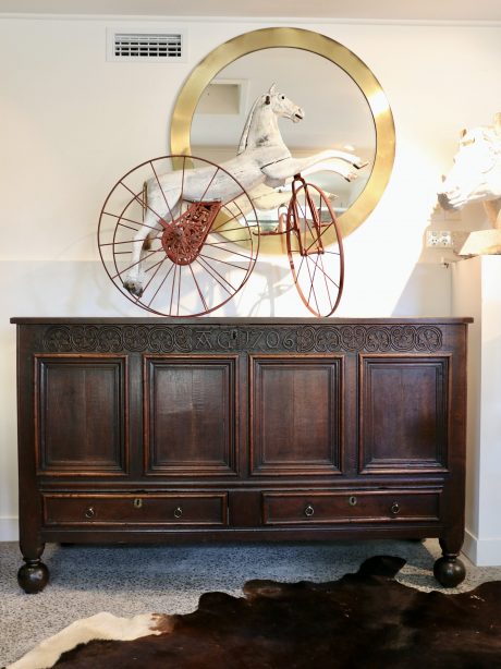 An early 18th century carved oak coffer 1706