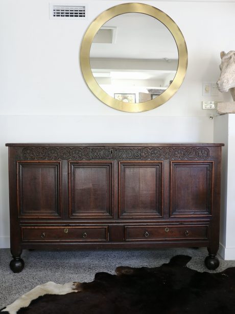 An early 18th century carved oak coffer 1706