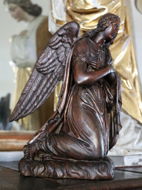 A rare pair of 17th century carved kneeling angels