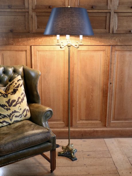 An elegant Empire style gilt bronze swan neck floor lamp