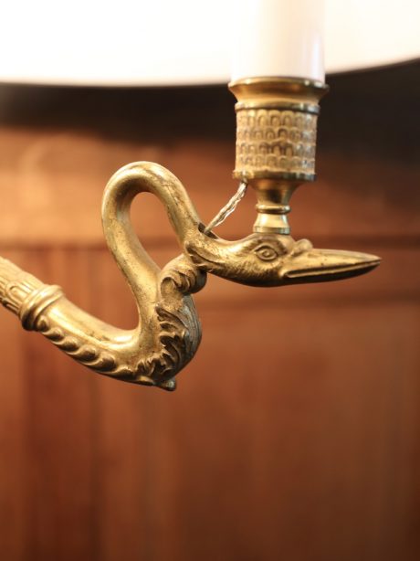 An elegant Empire style gilt bronze swan neck floor lamp