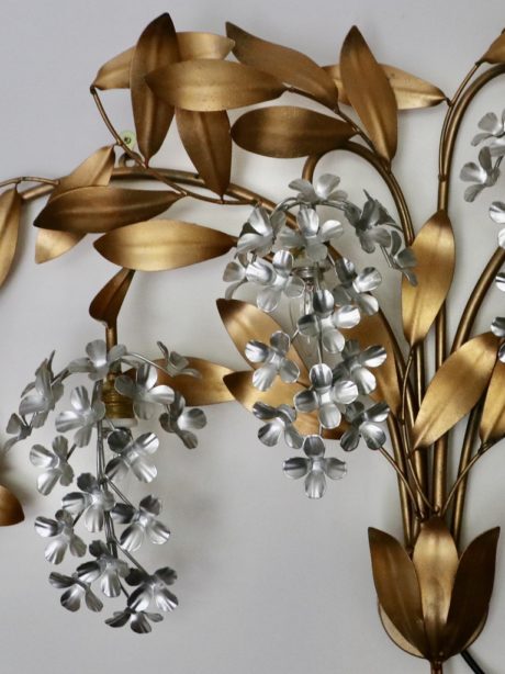 A mid-century gilt metal floral wall sconce