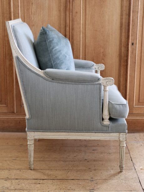 Antique Louis XVI style armchair and matching footstool