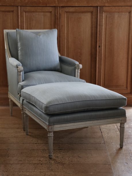 Antique Louis XVI style armchair and matching footstool