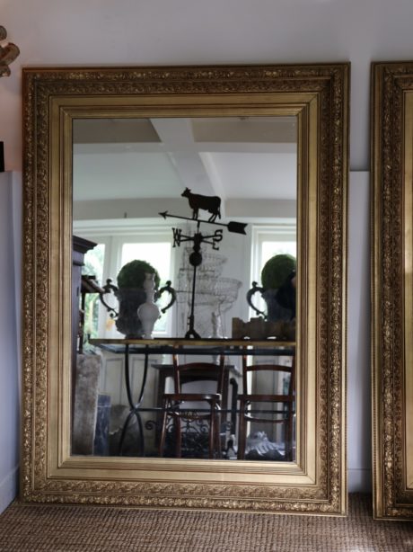 A monumental pair of 19th century gilded mirrors