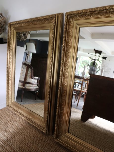 A monumental pair of 19th century gilded mirrors
